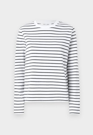 Long-sleeve shirt in white cotton with black horizontal stripes. Features a round neck and a relaxed fit. No notable accents or patterns.
