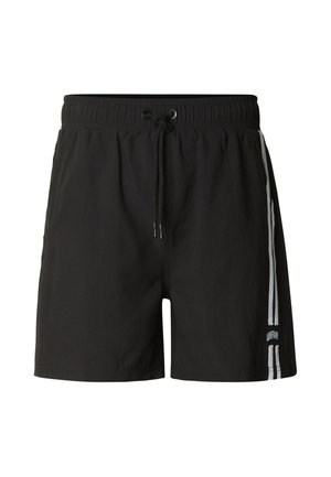 Mustat urheilushortsit, joissa on joustava vyötärönauha, kiristysnyöri ja kaksi valkoista pystysuoraa raitaa oikealla puolella lähellä helmaa, joissa lukee "UNFAIR".