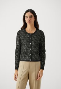 Black patterned cardigan with a round neckline, front buttons, and textured diamond design. Features long sleeves and contrasting cuffs.