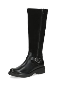 Botas negras hasta la rodilla hechas de cuero suave con una parte superior de ante texturizada. Cuenta con un cierre lateral y una hebilla decorativa en el tobillo.