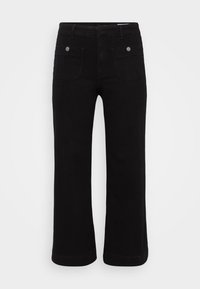 Svarta denimbyxor med rak benring, fem fickor och detaljer i silver. Slät textur och hållbart tyg.