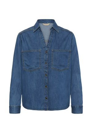 Kék farmering hosszú ujjal, két elülső zsebbel, gombos záródással és gallérral. Lazán illeszkedő szabású, finoman megfakult textúrával rendelkezik.