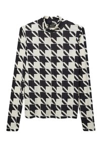 Haut à manches longues avec col roulé dans un motif géométrique noir et blanc. Présente une texture douce avec un design ajusté et un tissu extensible.