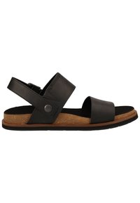 Sandale en cuir noir avec deux larges brides, semelle en liège et semelle en caoutchouc. Dispose d'un accent avec un bouton-pression sur la bride pour l'ajustement.