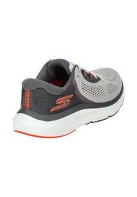 Gray athletic shoe with a breathable mesh upper, orange accents, and a cushioned white sole. Features a rounded toe and padded collar.