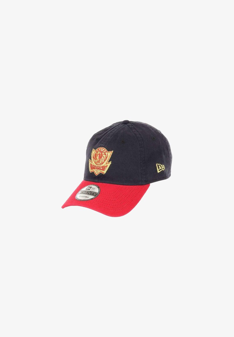 Navy blue cap with a red brim, featuring an embroidered logo in gold. Made of fabric, with ventilation eyelets on the top.
