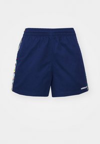 Bermudas deportivas de color azul marino con cintura elástica y detalles florales en los laterales. Presenta un pequeño logotipo de la marca en la parte inferior.