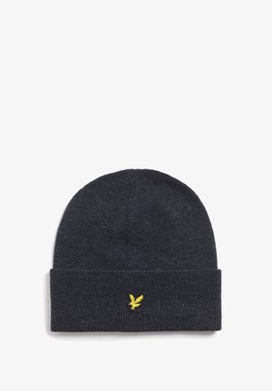 Căciulă tricotată ribbed de culoare bleumarin închis, cu margine pliată, având un mic logo cu o pasăre galbenă brodat pe față. Textură moale.