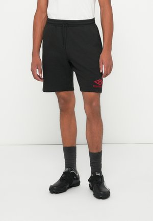 ICONIC SHORT - Træningsbukser - black/chili pepper