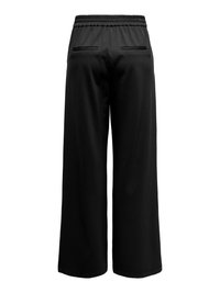 Pantalones negros de pierna ancha con cintura elástica, dos bolsillos traseros con detalles de tela y una textura suave.