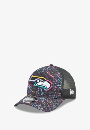 Black cap with a colorful splatter design, featuring a prominent embroidered team logo on the front and a mesh back for ventilation.