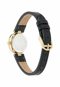 Black leather strap watch with a gold-tone case, round face, embossed texture, white dial, and gold accents. Suitable for water resistance.