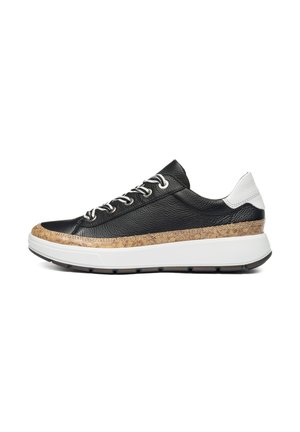 Black low-top sneaker with white heel, white sole, cork-textured midsole strip, and white laces on a clean white background.