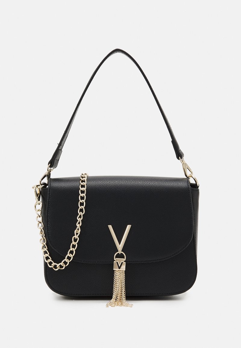 Black leather handbag with a textured finish, gold hardware, chain strap, and a V-shaped accent with a tassel detail.