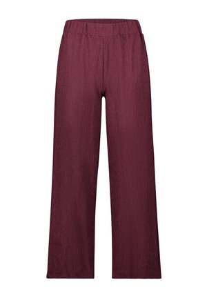 Pantalons larges en bordeaux. Fabriqués en tissu texturé avec une taille élastique. Longueur complète avec une coupe décontractée.