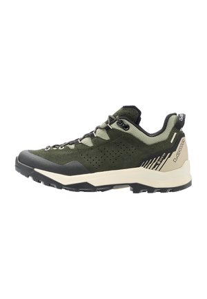 Dark green and beige low hiking shoe with black sole, metal eyelets, and Gore-Tex breathable waterproof material.