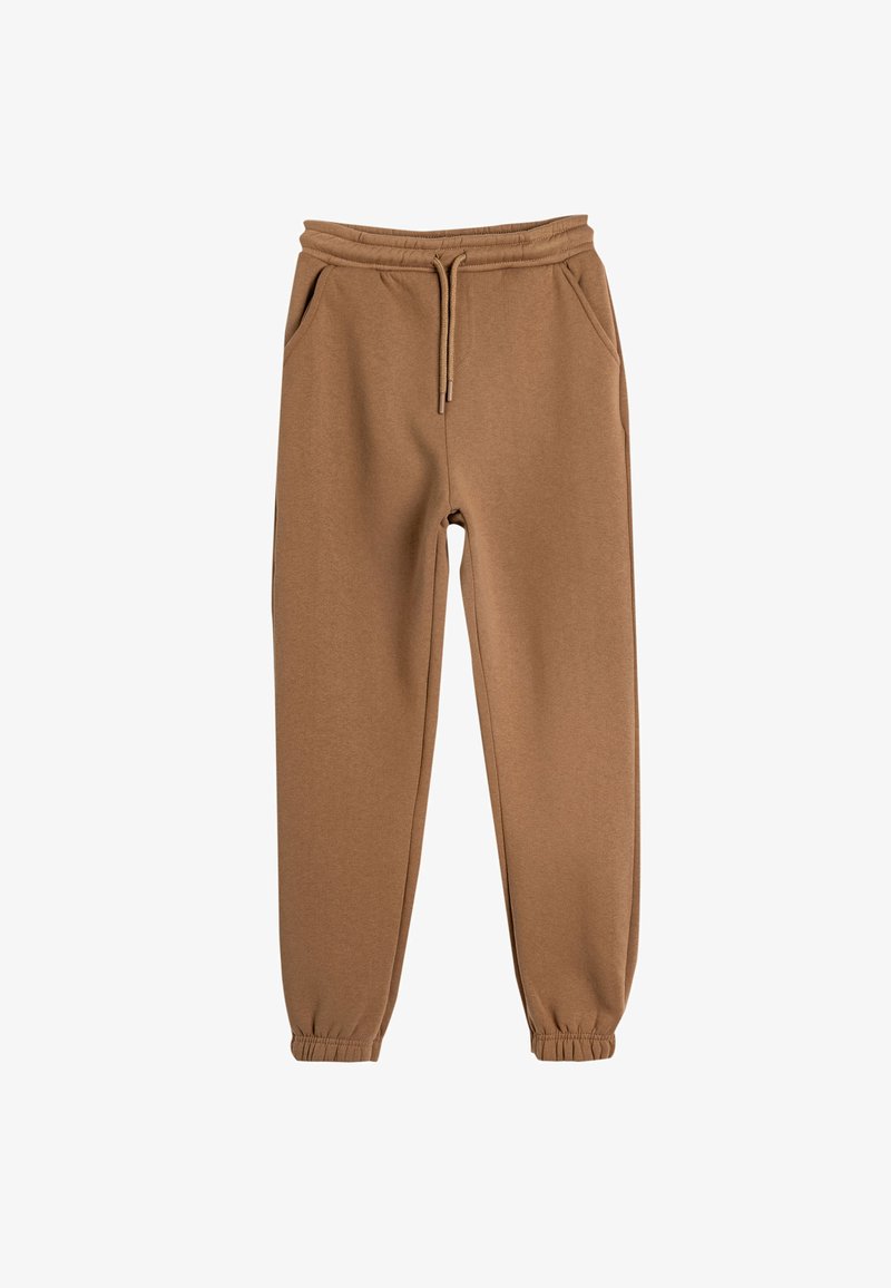 Pantalons de sport marron en tissu doux, avec une taille élastique dotée d'un cordon de serrage, des poches latérales et des poignets ajustés au niveau des chevilles.