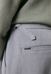 Don't Waste Culture MARQUIS UNISEX - Auduma bikses - light grey