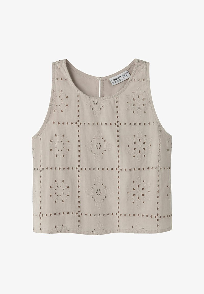 Top court sans manches beige avec motif brodé ajouré carré présentant des motifs floraux et un col rond.