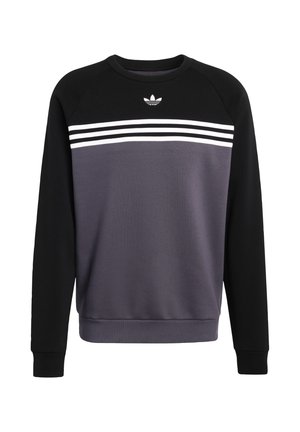 Pulover majica s raglan rukavima. Crni rukavi, sivo tijelo s tri bijele pruge preko prsiju. Mješavina pamuka, okrugli izrez.