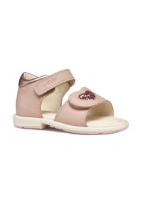 Sandal in pelle rosa con due cinturini regolabili, un dettaglio a forma di cuore in paillettes sul cinturino e una suola in gomma bianca con accenti rosa.