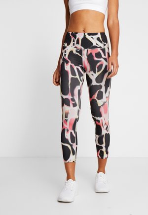 Leggings capri multicolores avec un motif abstrait fluide dans des tons noir, rose et crème. Fabriqués en tissu extensible et lisse pour un maximum de confort.
