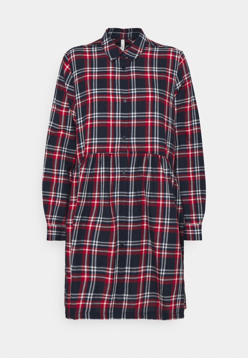 Plaid shirt dress featuring a button front, long sleeves, collar, elastic waist, and a mix of navy, red, and white colors. Soft fabric texture.