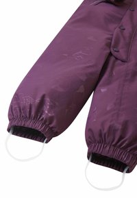 Purple children’s snowsuit with elastic cuffs, smooth texture, subtle patterns, and loops for securing gloves or mittens. Circular buttons featured.