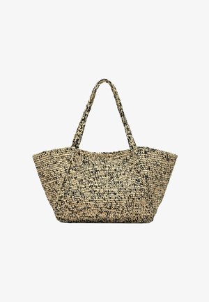 Sac cabas en paille tissée avec une base large, des côtés légèrement effilés et deux anses de longueur moyenne en couleurs beige naturel et noir.