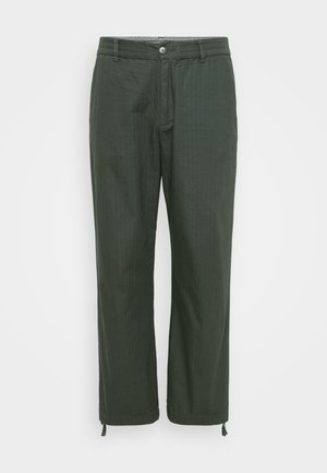 Trousers in dark green, made of smooth fabric. Straight-leg design with button closure, adjustable drawstrings at the hem.