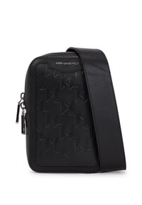 Borsa a tracolla nera con superficie testurizzata e motivi geometrici, tracolla regolabile e dettagli metallici.