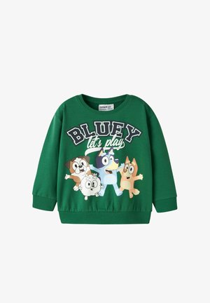 Sweat-shirt vert pour enfants avec des chiens en dessin animé et le texte "BLUEY jouons" sur le devant.
