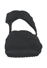 Black sandals with adjustable straps, made of soft material, featuring a textured footbed and a flexible rubber sole for grip.
