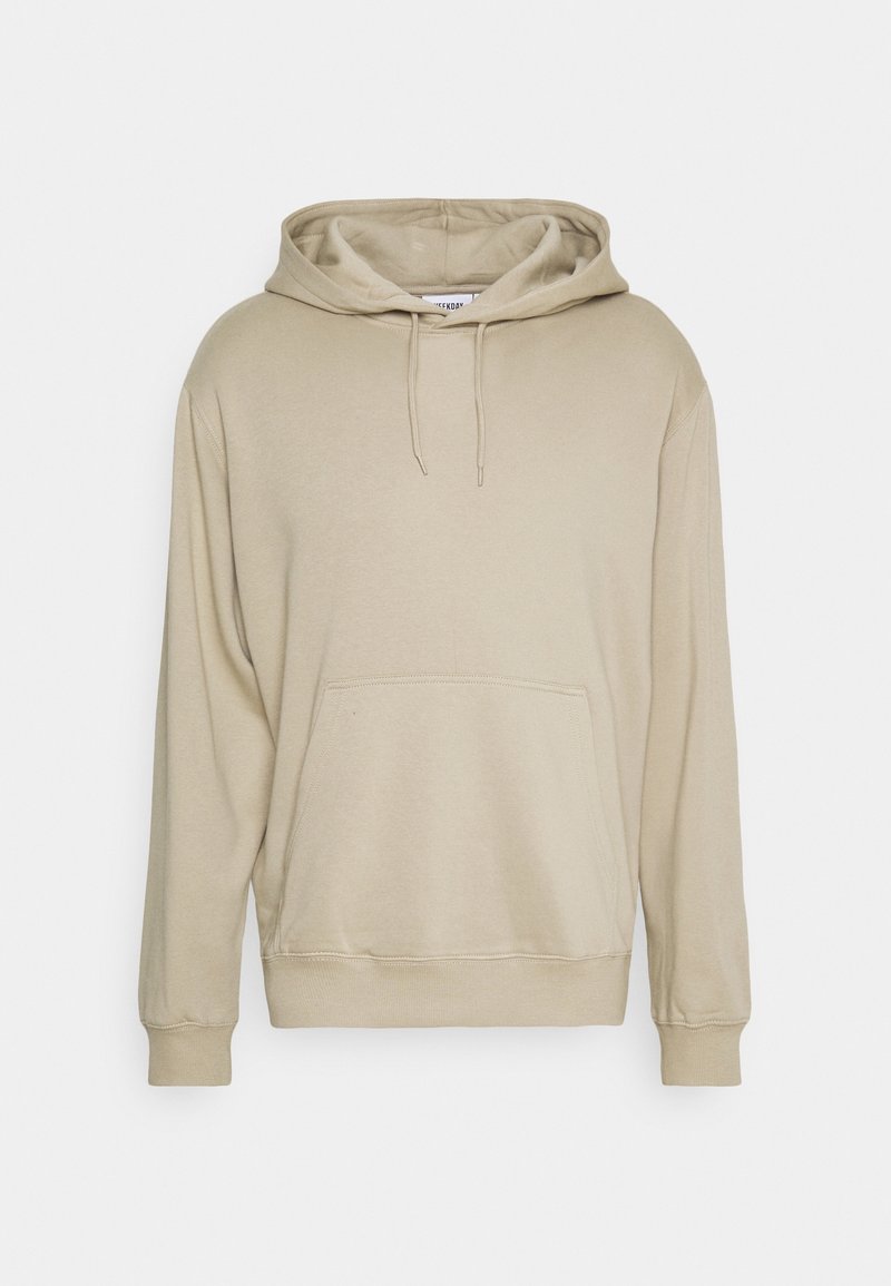 Sweat à capuche beige à enfiler avec poche kangourou devant, manches longues, poignets et ourlet côtelés, et capuche ajustable avec cordon de serrage.
