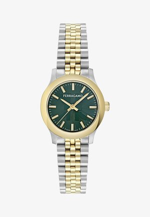 Reloj de metal en tonos dorado y plateado con una esfera verde estampada. Presenta marcadores de hora en negrita, agujas delgadas y una pulsera bicolor.