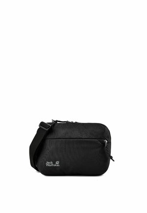 Compact black Jack Wolfskin crossbody bag with adjustable strap and front zip pocket on white background.