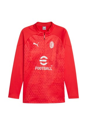 Maglia da allenamento dell'AC Milan a maniche lunghe di colore rosso, con logo Puma, stemma del club e motivo geometrico, dotata di una cerniera corta sul davanti.