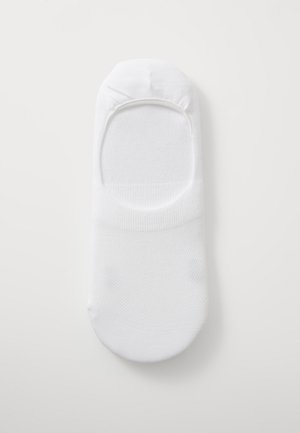 Chaussette blanche mi-bas en coton texturé, avec un haut lisse, une bordure élastique pour un maintien sûr et un design sans coutures.