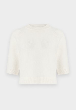 Pletený sveter s krátkym rukávom v krémovej farbe. Má rebrovaný výstrih a lem, voľný strih a mäkkú, štruktúrovanú látku.