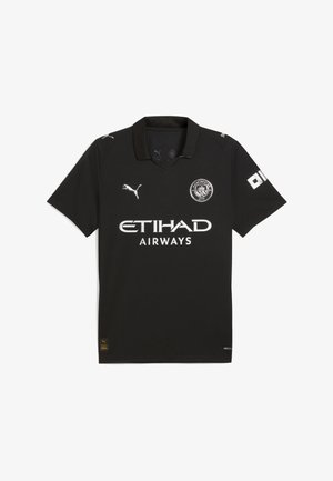 Crna nogometna majica s kratkim rukavima od laganog materijala, s V-izrezom, PUMA logotipom, grbom Manchester Cityja i bijelim sponzorskim tekstom.
