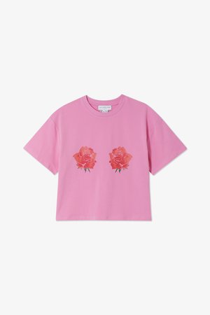 Pink cropped t-shirt made of cotton featuring two red and pink rose graphics on the front, with a round neckline and short sleeves.