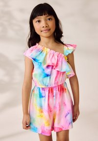 Salopetă colorată în nuanțe pastelate de roz, albastru și galben. Are un design cu o singură umăr cu volane, talie elastică și picioare scurte.