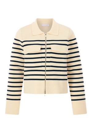 Crème-kleurige cropped cardigan met marineblauwe strepen, voorzien van een rits aan de voorkant, een kraag en twee borstzakken. Getextureerde brei-stof.