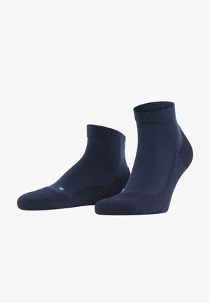 Calze alla caviglia di colore blu scuro con bordo a coste e punta e tallone rinforzati. Realizzate in un materiale morbido con una superficie liscia.