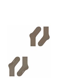 Bruine sokken met een gematteerde afwerking, met contrasterende oranje stippen op het ene paar en witte stippen op het andere, ontworpen voor comfort en grip.