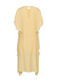 Robe midi jaune clair avec manches volantes, encolure dos avec ouverture en forme de goutte et détail asymétrique à l’ourlet.