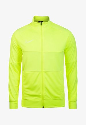 Veste zippée Nike jaune-vert vif avec manches longues, col montant et logo Nike Swoosh blanc sur la poitrine gauche.