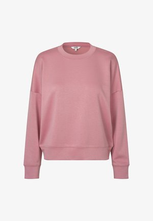 Rozā garroku džemperis ar apaļu kakla izgriezumu, ar ribveida aprocēm un apakšmalu, attēlots uz tīri baltas fona.