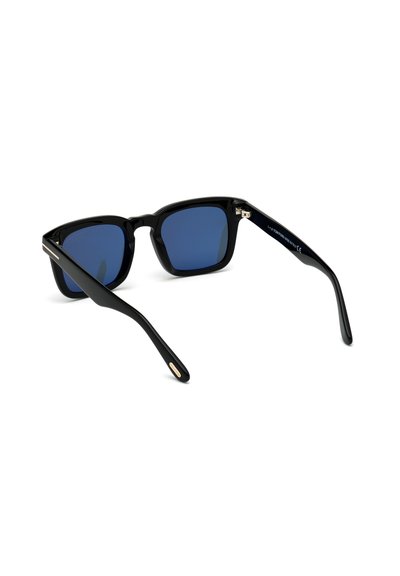 Black sunglasses with blue lenses, square frames, glossy finish, and tapered arms featuring subtle gold accents near the hinges.