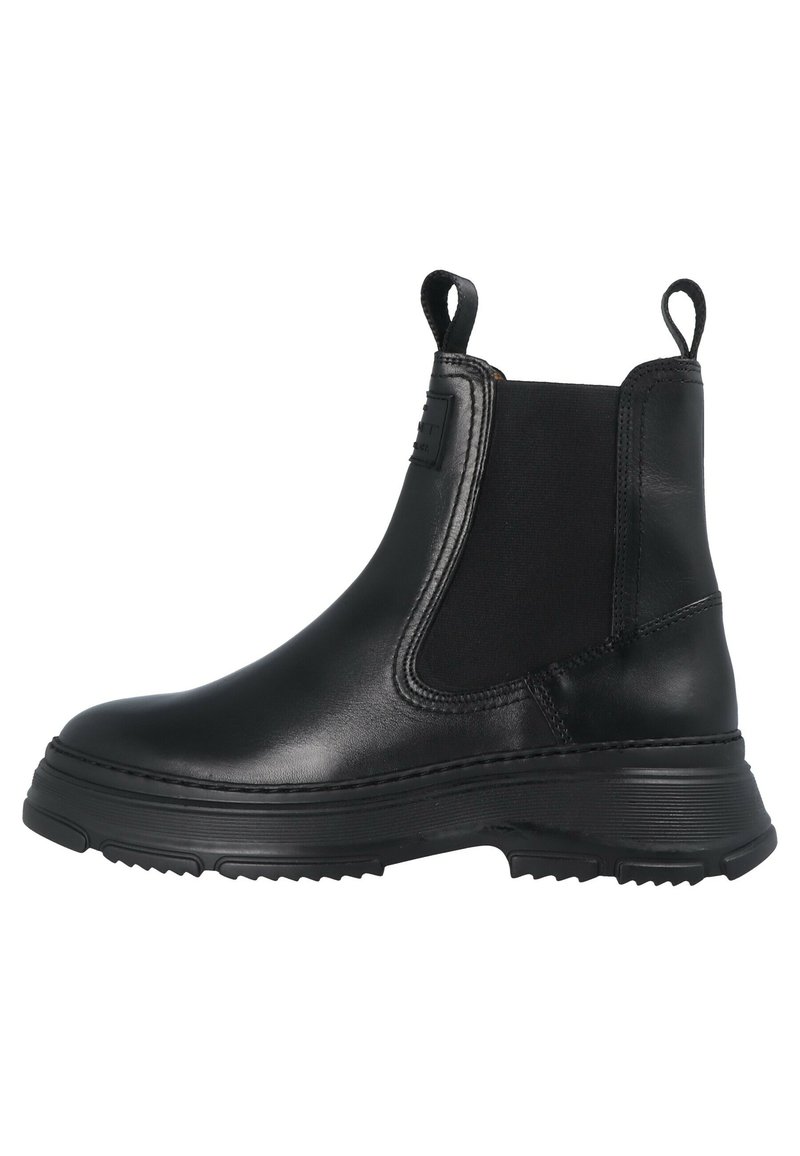 Botas de tobillo de cuero negro con paneles laterales elásticos, puntera redonda, tiradores y suela de goma texturizada para agarre y comodidad.